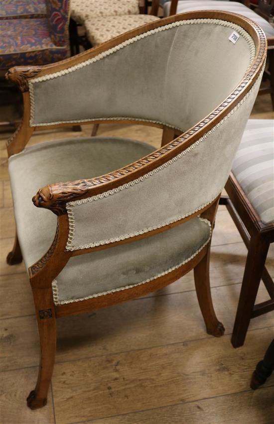 A 19th century Biedermeier tub shaped armchair